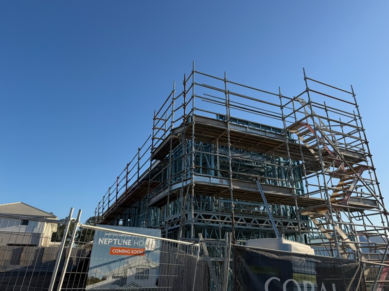 Residential scaffolding with site perimeter fencing