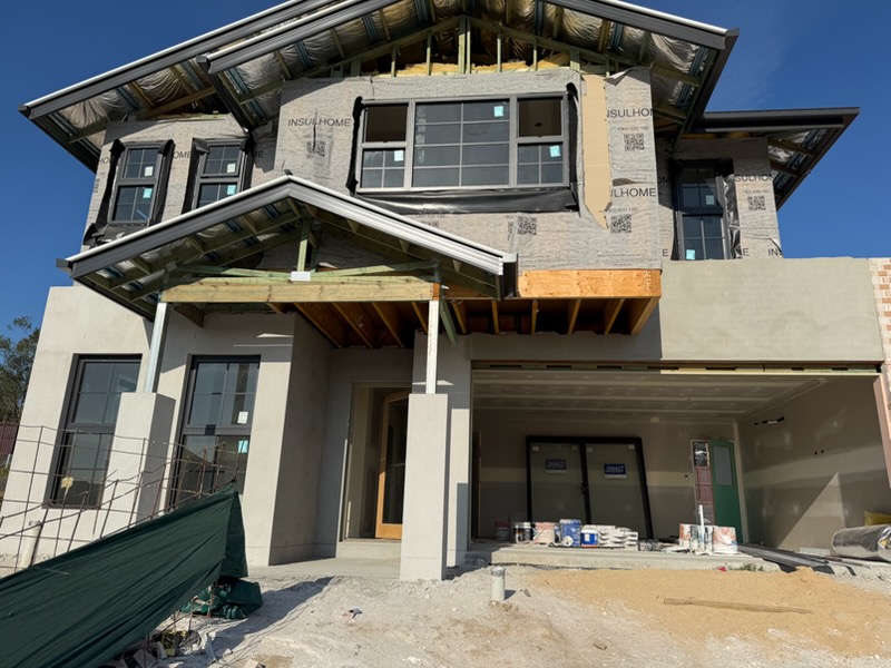 Scaffolding around a residential shell