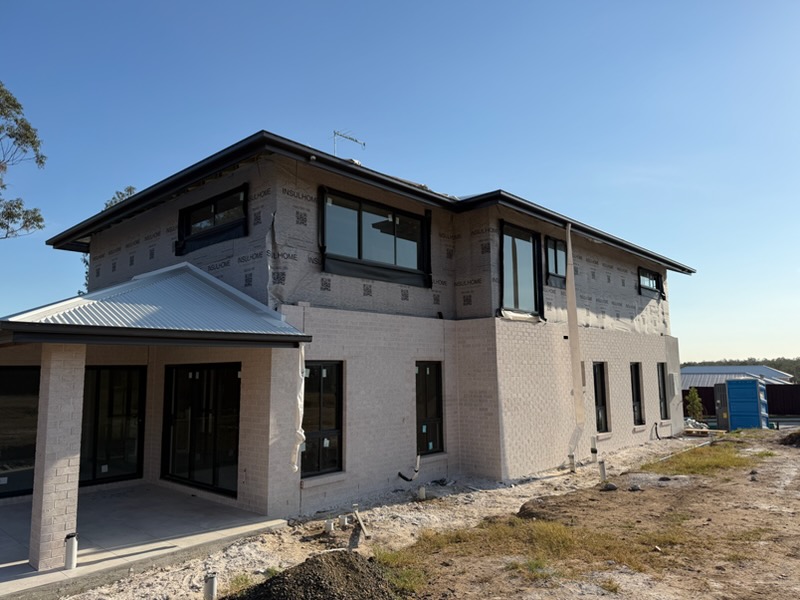 Residential brickwork and upper-level wrap access
